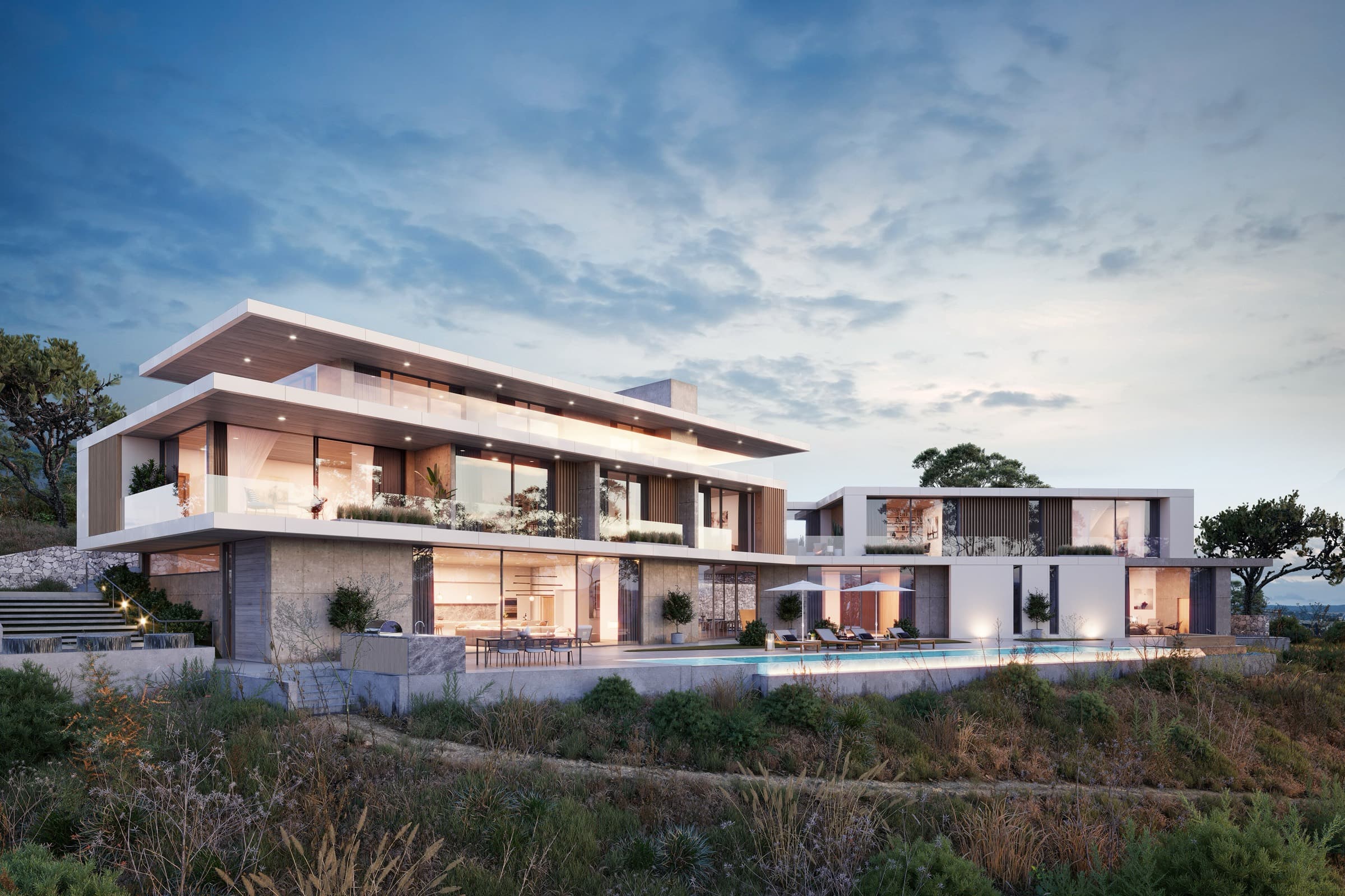A contemporary residence at dusk, lit from within